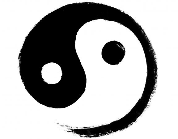 Yin Yang sign representing the masculine male energy and the feminine female energies in divine balance