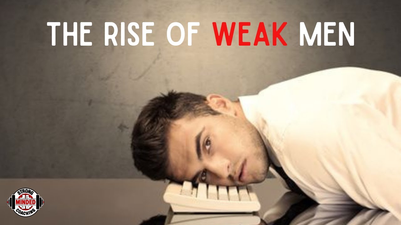 The rise of weak men: a man rests his head on a keyboard looking discouraged and weak