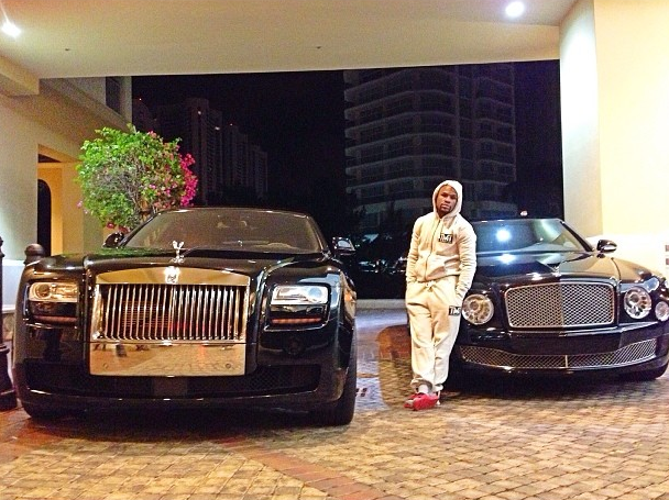 Floyd Mayweather with black rolls royce car and bentley cars in his luxurious expensive collection