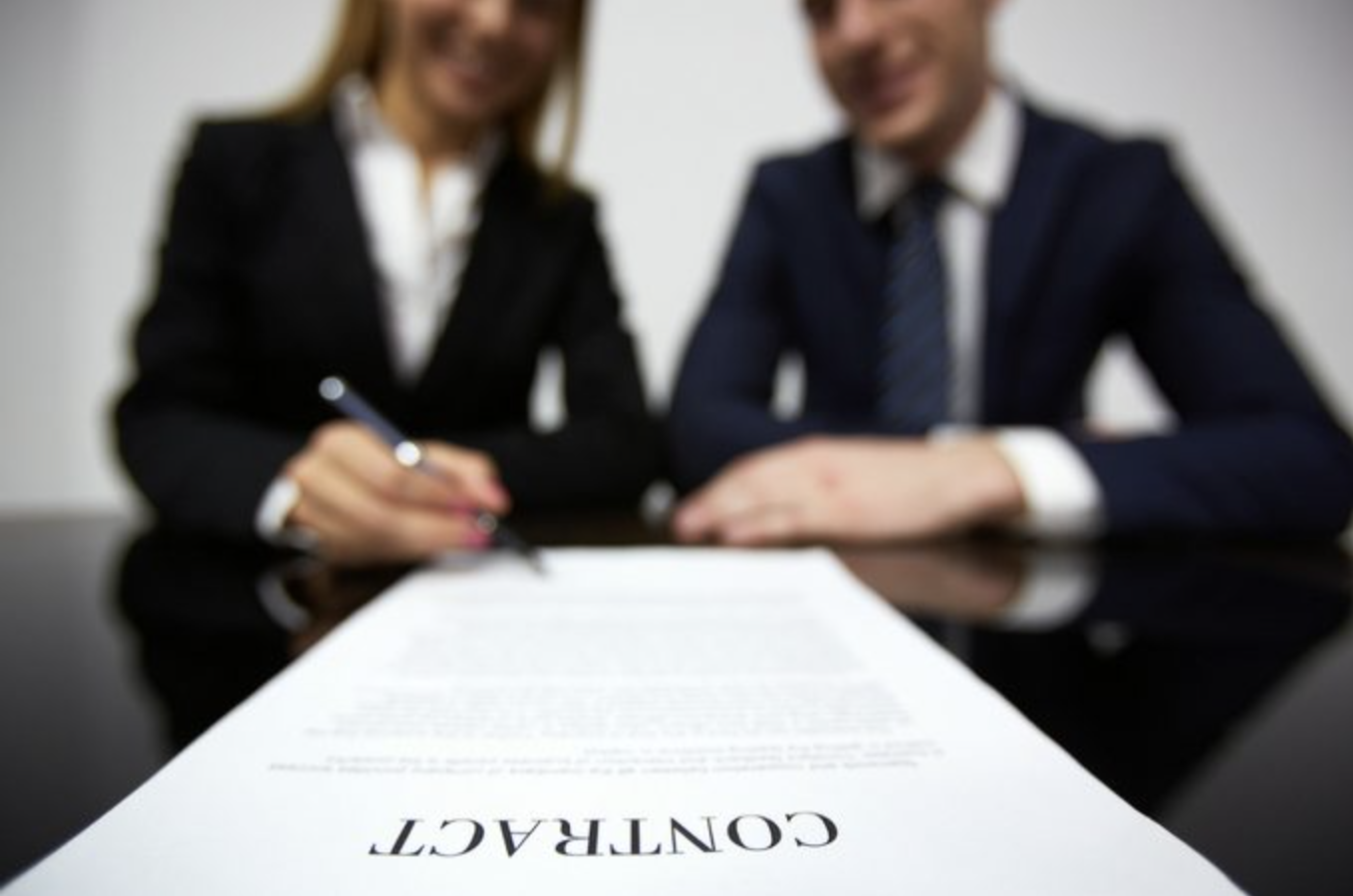 Relationship couple signing contract of between man and woman