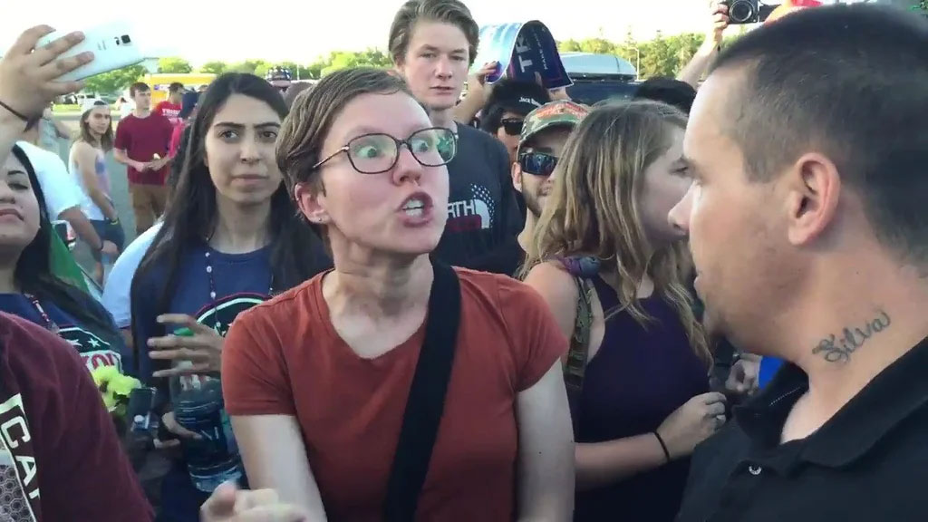 angry feminist shouting at feminism protest