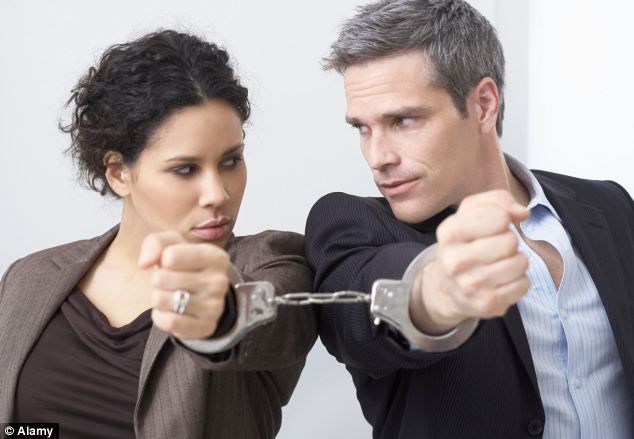 Modern marriage fails because woman and man are locked together with handcuffs